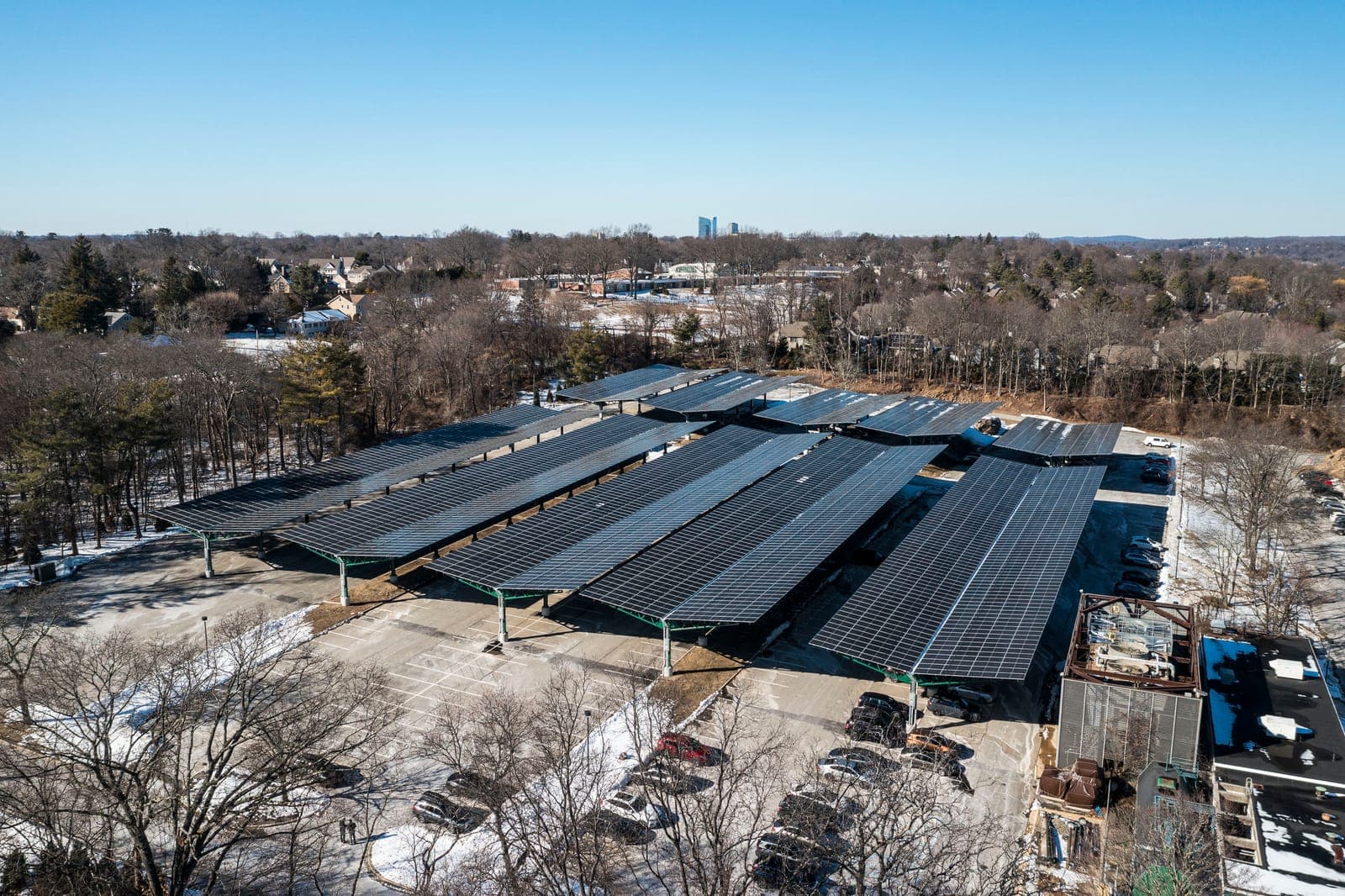 Aerial view of solar carport canopies over a parking lot