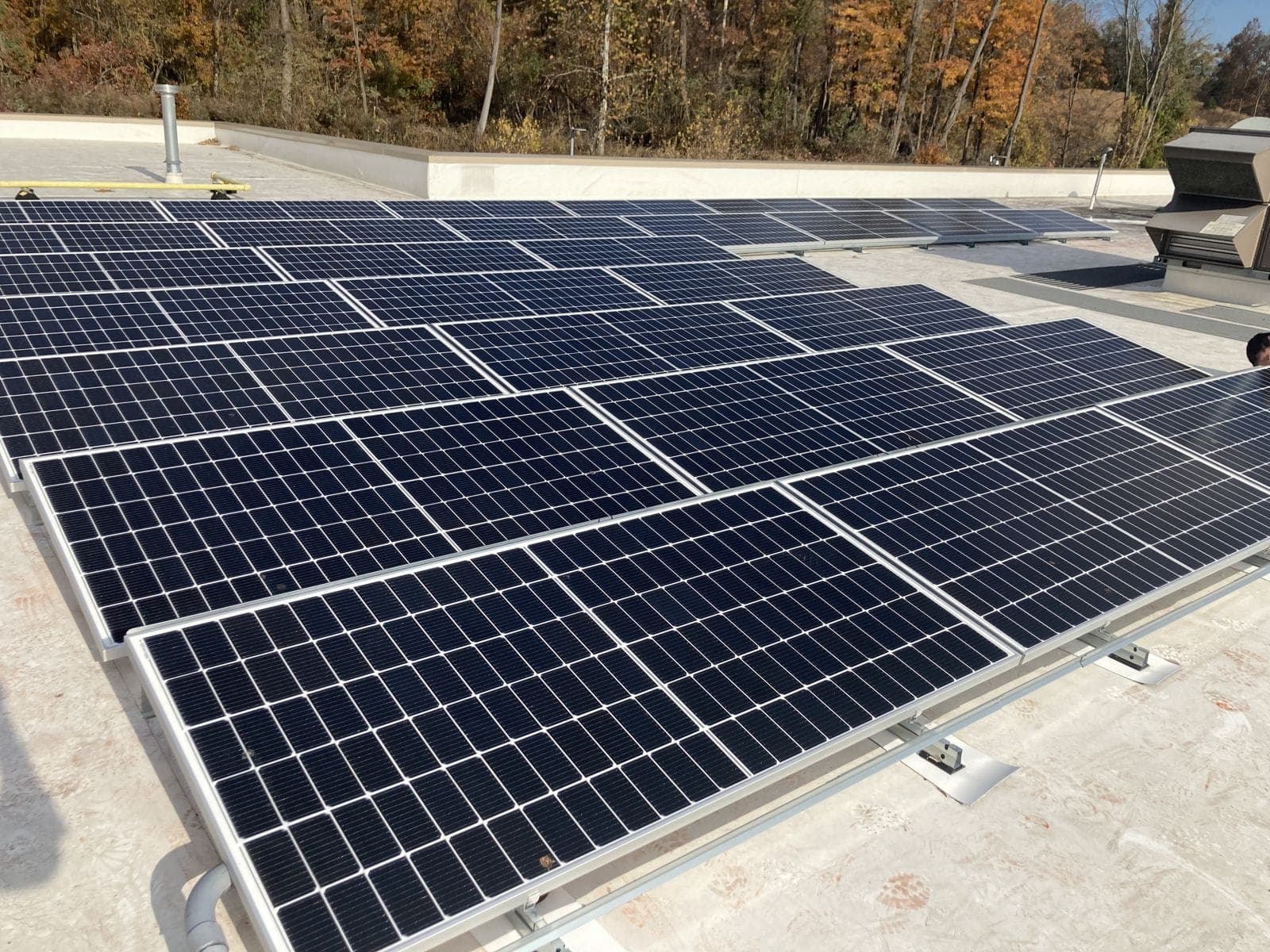 Rooftop solar array on a REIT-owned commercial building