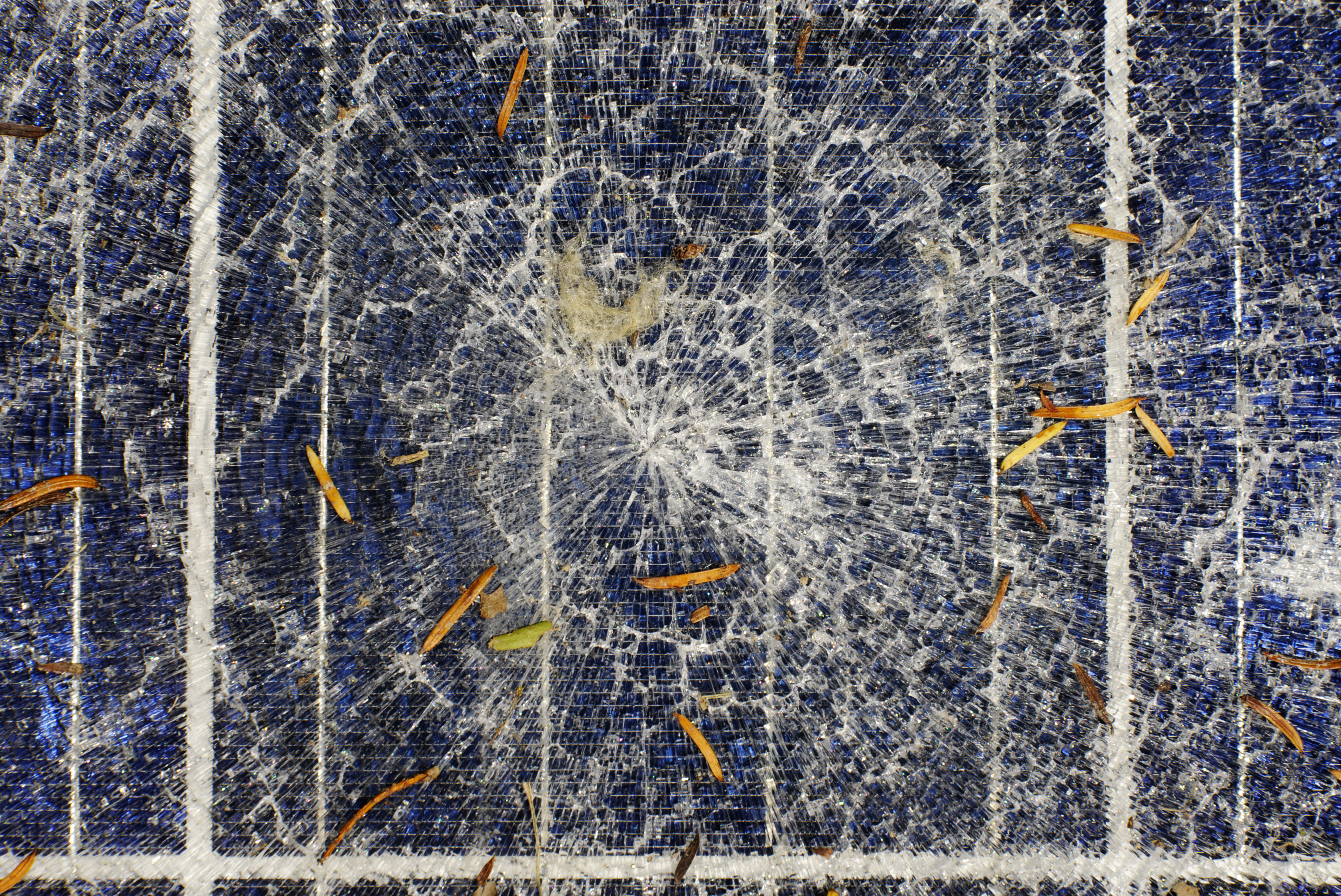 Damaged solar panel array showing wear and deterioration